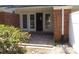 Brick patio with French doors leading into home at 7118 Quail Meadow Ln, Charlotte, NC 28210