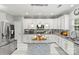 Modern kitchen with stainless steel appliances and granite countertops at 1229 Brecken Ct, Kannapolis, NC 28081