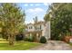 Two-story brick home with landscaped yard and driveway at 1229 Brecken Ct, Kannapolis, NC 28081