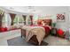 Bright bedroom with window seat, decorative pillows and cozy bedding at 1229 Brecken Ct, Kannapolis, NC 28081