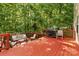 Spacious deck with seating area and wooded backdrop at 1229 Brecken Ct, Kannapolis, NC 28081