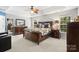 Spacious Primary bedroom with wood furniture and ceiling fan at 1229 Brecken Ct, Kannapolis, NC 28081