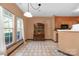 Cozy dining area with wood table and chairs near kitchen at 12136 Cane Branch Way, Huntersville, NC 28078