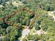 Aerial view showing property lines in a wooded area at 700 Cove Rd, Gastonia, NC 28052