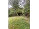 Mobile home nestled in a wooded area at 6134 Shirley Rd, Fort Lawn, SC 29714