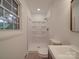 Updated bathroom with shower and window at 610 Davis St, Lancaster, SC 29720