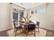 Bright dining area with concrete table and chairs, near sliding door to patio at 1223 Sugar Creek Rd, Indian Land, SC 29707