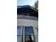 Shows significant damage to the home's exterior at 215 S Ervin Ave, Newton, NC 28658