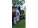Exterior shows significant damage and needs complete renovation at 215 S Ervin Ave, Newton, NC 28658