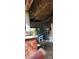 Porch shows significant damage from fire and neglect; needs restoration at 215 S Ervin Ave, Newton, NC 28658