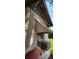 Needs significant repair; shows damage to the siding and window frames at 215 S Ervin Ave, Newton, NC 28658