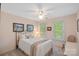 Cozy bedroom with a comfortable bed and plenty of natural light at 8907 Pointview Pl, Charlotte, NC 28269