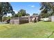 Large backyard with deck and steps leading to the lawn at 5428 Alpine Ln, Charlotte, NC 28269