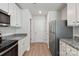 Modern kitchen with stainless steel appliances and granite countertops at 146 Adams Tree Way, Troutman, NC 28166