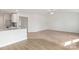 Spacious living room with neutral carpeting and hardwood floors at 146 Adams Tree Way, Troutman, NC 28166
