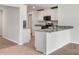 Modern kitchen with granite countertops and stainless steel appliances at 217 Colonial Reserve Ave, Troutman, NC 28166