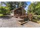 Lakefront cottage with wrap around deck and stone retaining wall at 746 Springwood Dr # 14&15, Mount Gilead, NC 27306