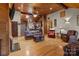 Open living room and kitchen with hardwood floors and vaulted ceiling at 746 Springwood Dr # 14&15, Mount Gilead, NC 27306