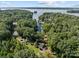 Aerial view of lakefront property with home at 746 Springwood Dr # 14&15, Mount Gilead, NC 27306