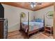 Bedroom with a full-size bed and a dresser at 746 Springwood Dr # 14&15, Mount Gilead, NC 27306
