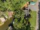Aerial view showcasing house, boathouse, and lakefront at 746 Springwood Dr # 14&15, Mount Gilead, NC 27306