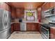 Updated kitchen featuring stainless steel appliances and wood cabinets at 746 Springwood Dr # 14&15, Mount Gilead, NC 27306