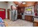 Modern kitchen with stainless steel appliances and wood cabinets at 746 Springwood Dr # 14&15, Mount Gilead, NC 27306