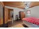 Spacious bedroom with wood floors and ceiling fan at 746 Springwood Dr # 14&15, Mount Gilead, NC 27306