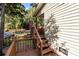 Exterior view of home with wooden steps leading to deck at 746 Springwood Dr # 14&15, Mount Gilead, NC 27306