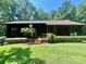 House front view, wood siding, brown roof, and manicured lawn at 460 27Th Avenue Nw Cir, Hickory, NC 28601