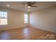 Bright bedroom with hardwood floors and large windows offering natural light at 2876 W Nc 27 Hwy, Lincolnton, NC 28092