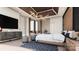 Main bedroom with wood wall accents and large bed at 214 Seldon Dr, Charlotte, NC 28216