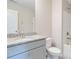 Bathroom with granite countertop and gray vanity at 2465 Palmdale Walk Dr, Fort Mill, SC 29708