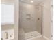Large walk-in shower with glass enclosure and built-in seat at 2465 Palmdale Walk Dr, Fort Mill, SC 29708