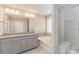 Spa-like bathroom with soaking tub and shower at 2465 Palmdale Walk Dr, Fort Mill, SC 29708