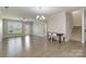 Spacious living room with hardwood floors and open concept layout at 2465 Palmdale Walk Dr, Fort Mill, SC 29708