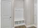 Functional entryway with built-in bench and storage at 2465 Palmdale Walk Dr, Fort Mill, SC 29708