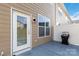 Backyard patio with exterior door access and grill at 2465 Palmdale Walk Dr, Fort Mill, SC 29708