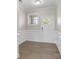Bright foyer with hardwood floors and wainscoting at 2465 Palmdale Walk Dr, Fort Mill, SC 29708