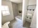 Bathroom with a tub, shower, and built-in shelving at 504 Circle Dr, Shelby, NC 28150