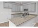 Modern kitchen featuring granite countertops and stainless steel appliances at 5332 Cherrie Kate Ct # 1703, Stanley, NC 28164