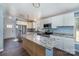 Modern kitchen with granite countertops and island at 4438 Old Davis Rd, Norwood, NC 28128