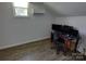 Home office featuring multiple monitors, a desk, and dark hardwood floors at 2214 Old Concord Rd, Salisbury, NC 28146