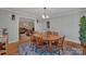 Dining room with a table for six, view to living room at 700 Wood St, Troy, NC 27371