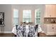 Kitchen dining area with a table for four, set for a meal at 924 Marshville Olive Branch Rd, Marshville, NC 28103