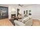 Living room with fireplace, built-ins, and access to the outdoors at 3821 Karrington Pl, Monroe, NC 28110