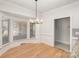 Breakfast nook with hardwood floors and bay window at 3821 Karrington Pl, Monroe, NC 28110