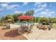 Spacious patio with pool, firepit, and seating area at 3821 Karrington Pl, Monroe, NC 28110