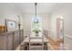 Bright dining room featuring hardwood floors and large window at 3821 Karrington Pl, Monroe, NC 28110