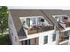 Private rooftop deck with seating area, perfect for entertaining at 3020 Endhaven Terraces Ln # 10, Charlotte, NC 28277
